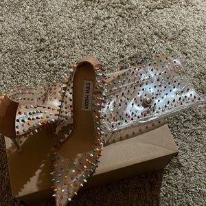 Never worn Steven madden heels with matching purse